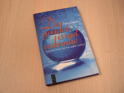 Dann, P. -  De goudvis is met vakantie / over een kind dat een ouder verliest